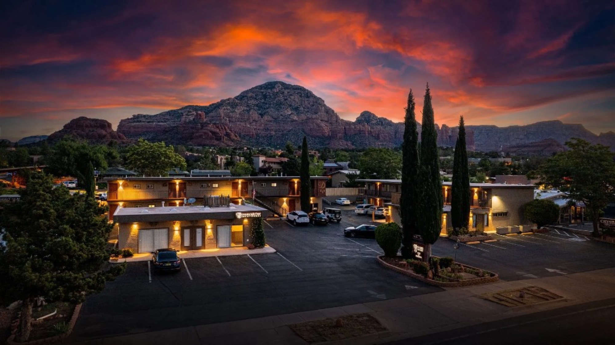 A Sedona boutique hotel with modern rooms, kitchenettes, and views toward Thunder Mountain.